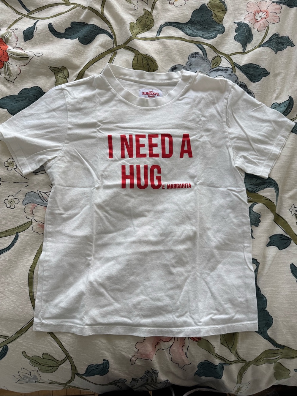 sundays White Tee with Red "I NEED A HUG" Graphic